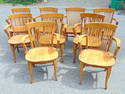 9 oak arm chairs by Heywood Wakefield, from the Beacon Engine company, 3 are missing spindles in