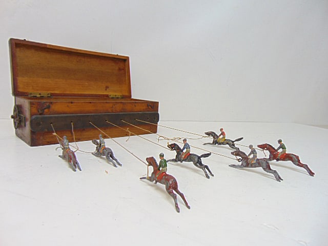Tabletop horse racing game, circa 1900, with 6 lead horses in original box, string broken on two (1 of 6)