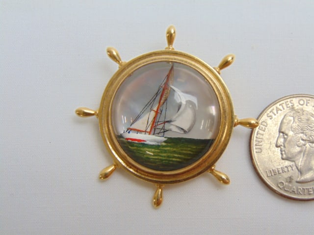 Jewelry. 14kt gold ships wheel pin decorated w/ MOP, 16.80 grams, 1 1/2" x 1 1/2", hallmark 14k good (1 of 4)