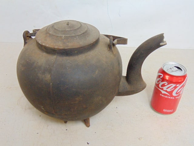 Cast iron kettle with lid and swing arm handle, handle is loose, 12" long, 9" wide, height is 8.5" (1 of 4)