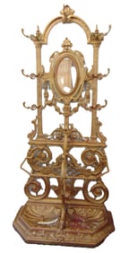 Ornate iron hall tree by Alfred Corneau, A. Charleville, No 26, in gold paint, with shell shaped dri