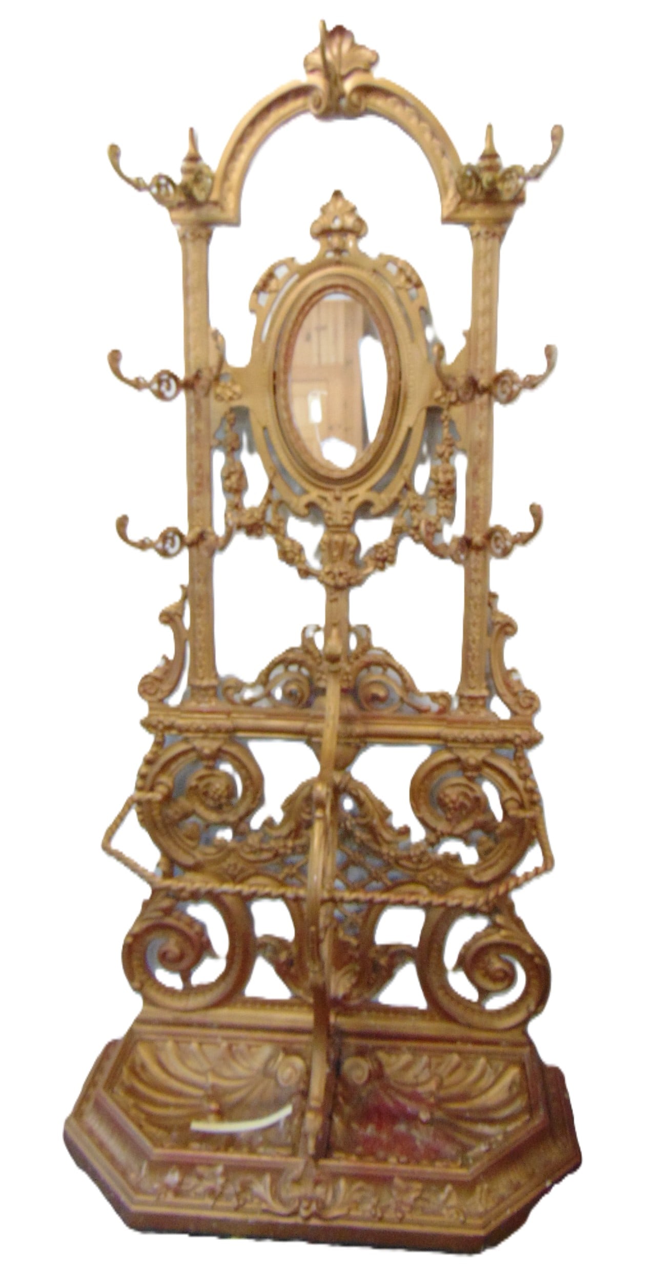 Ornate iron hall tree by Alfred Corneau, A. Charleville, No 26, in gold paint, with shell shaped dri