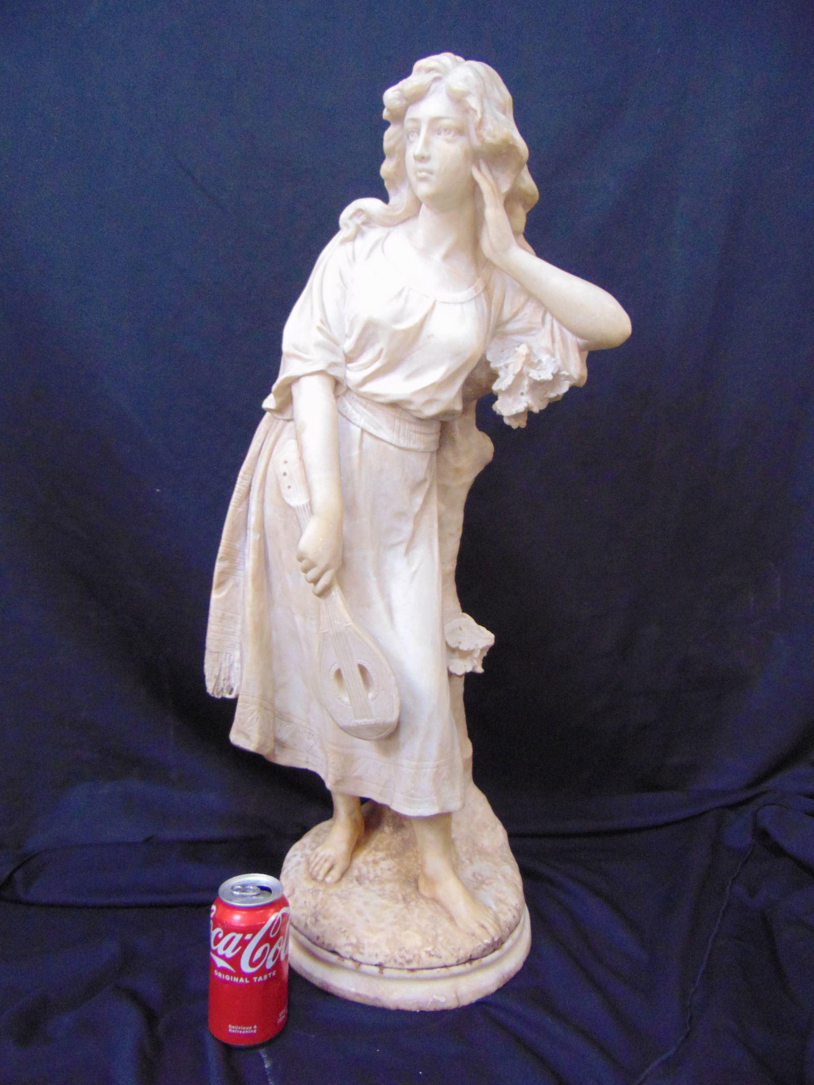 Large carved alabaster statue of a girl holding mandolin while leaning against tree trunk, signed Ce (1 of 12)