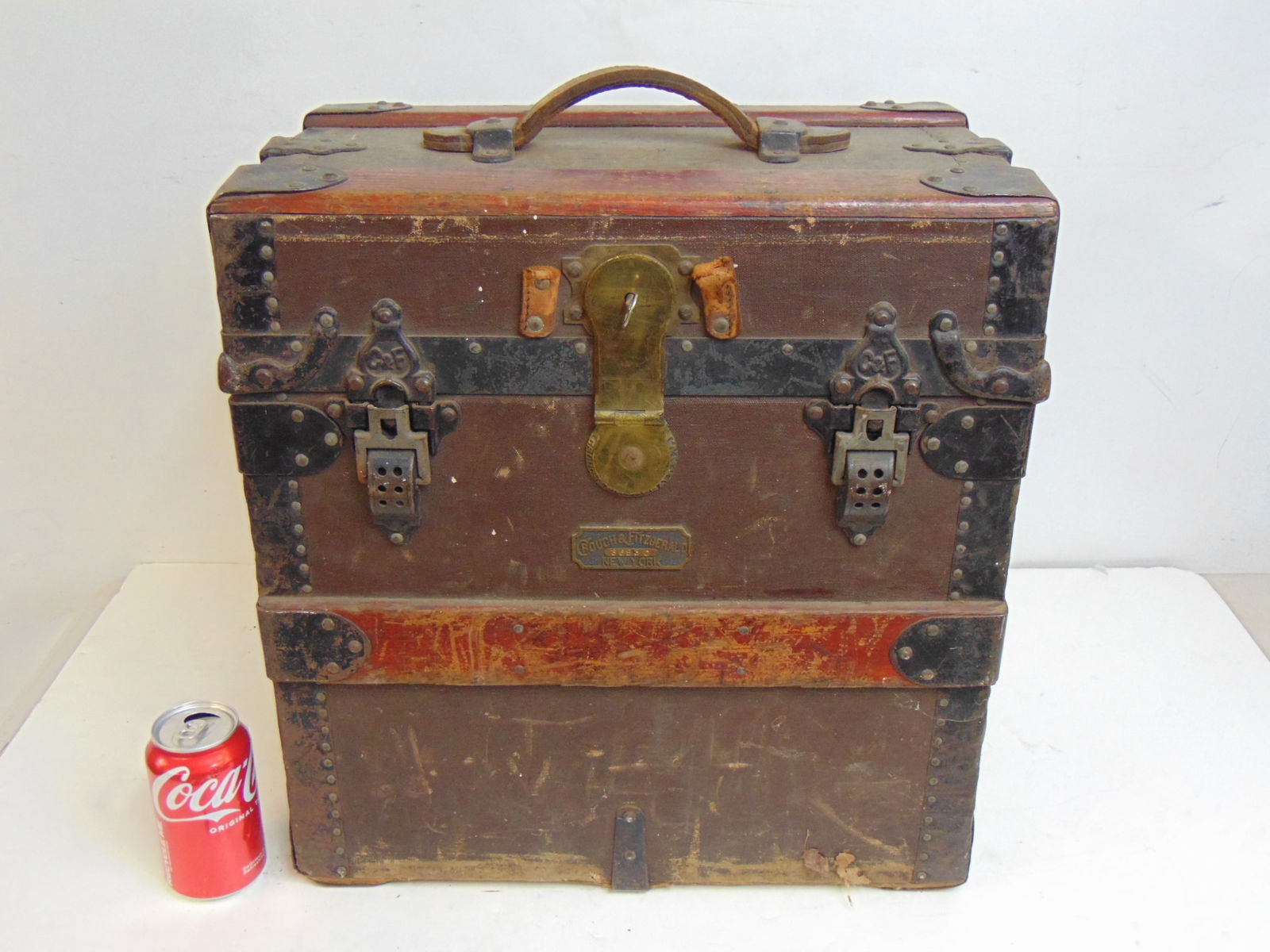Small trunk by Crouch & Fitzgerald, New York, with decorative latches, center latch with key, trunk (1 of 7)