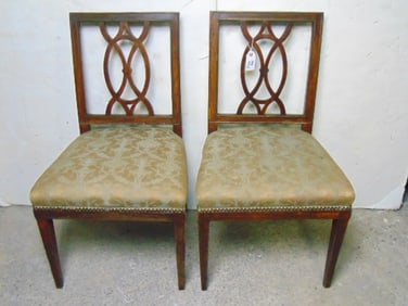 Pair of upholstered chairs with upholstered seats