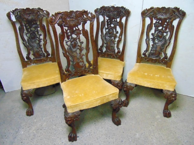 Set of four heavily carved dining chairs with fabric seats: Set of four heavily carved dining chairs with fabric seats