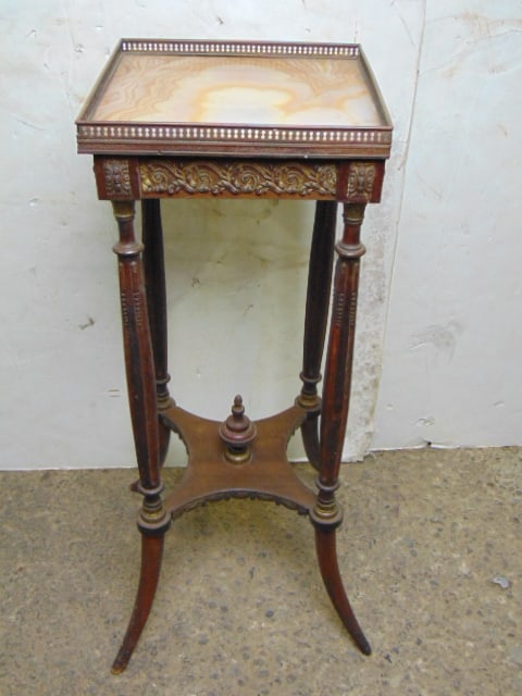 Alabaster and magogany stand with brass trim: Alabaster and magogany stand with brass trim