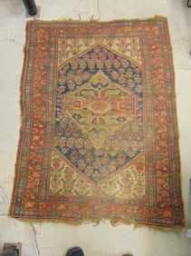 Persian scatter rug, worn, 67" by 51"