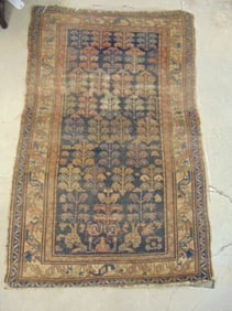 Persian scatter rug, worn, 66" by 43"