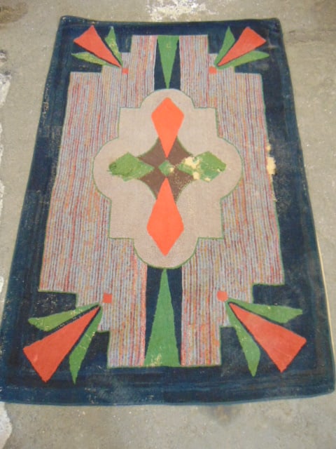 Hooked rug, geometric design, worn, has loss, 81" by 54" (1 of 2)