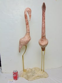 Pair of carved stone birds, one as is