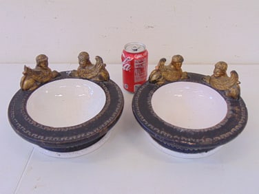 Two Italian cashpots, with griffins chips