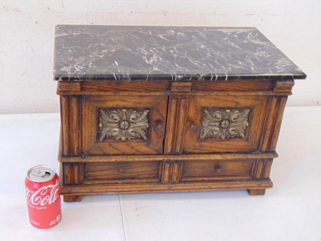 Small carved cabinet with marble top: Small carved cabinet with marble top