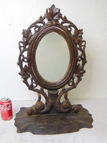 Carved Black Forest mirror