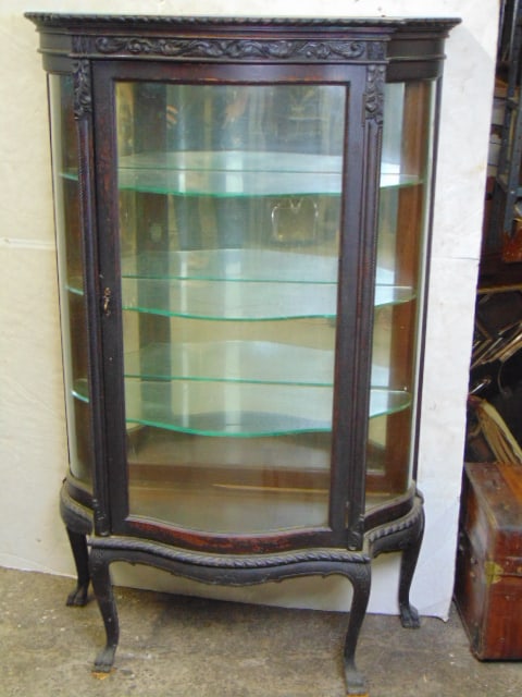 Oak serpentine china closet: Oak serpentine china closet