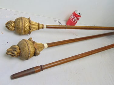 2 carved gilt parade poles