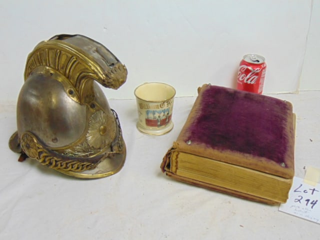 Photo album, helmet, as is shaving mug: Photo album, helmet, as is shaving mug