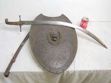 Cast iron shield and two blades