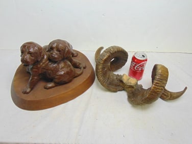 Dog sculpture and faux ram horns