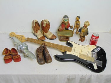 Toys, guitar and vintage shoes