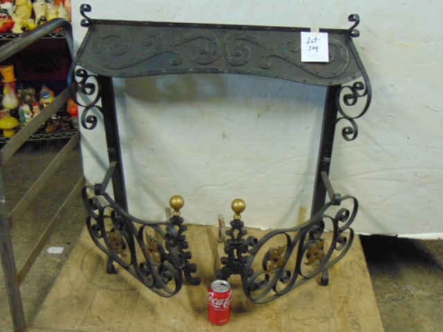 Wrought iron hearth and a pair of andirons: Wrought iron hearth and a pair of andirons