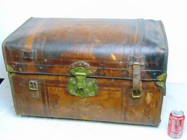 Tooled leather trunk