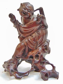 Early Chinese figural wood carving, Buddha figure with animal on shoulder, 6.5" tall, small piece of