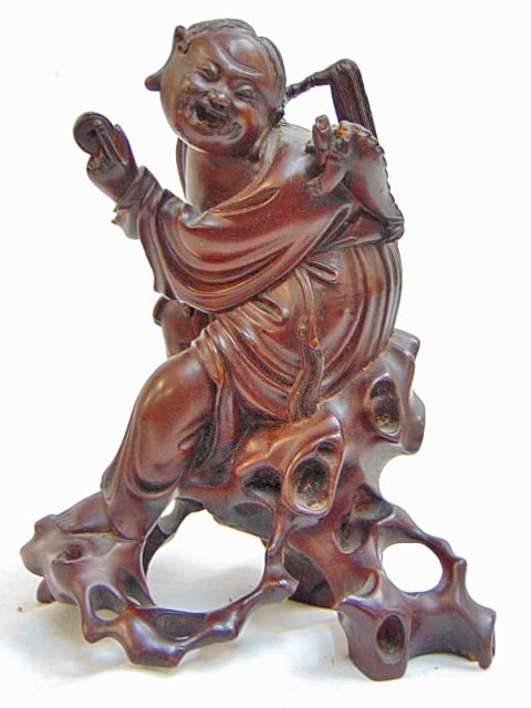 Early Chinese figural wood carving, Buddha figure with animal on shoulder, 6.5" tall, small piece of: Early Chinese figural wood carving, Buddha figure with animal on shoulder, 6.5" tall, small piece of carving missing of base, small repair to ponytail.