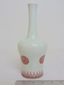 White Chinese vase with red decorations, tall neck, vase is signed and in good condition, no cracks,