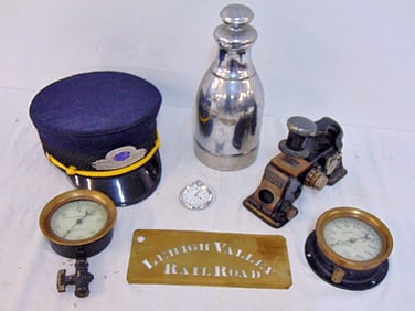 7 piece train, railroad lot, includes New York Central Brakeman cap, Lehigh Valley brass paint