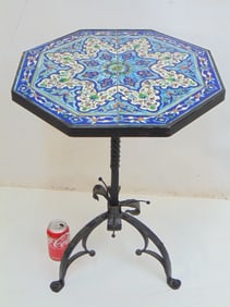 Persian tile top tilt top stand, wrought iron base, top is 17" by 17", height is 24.5"