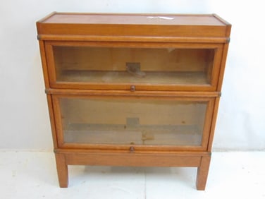 Stack oak banister bookcase by Globe-Wernicke Co, 38.25", two sections plus base & top, 34" wide,