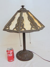Table lamp with slag glass panel shade, lamp is 19.5" tall, shade is 14" wide.