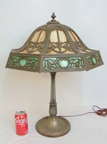 Table lamp with slag glass panel shade, two tone glass, skirt is green, lamp is 24.5" tall, shade