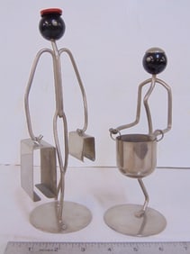 2 figures, art Deco barware by Napier, stick figure with pot & figure with suitcases, height is