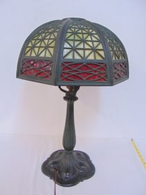 Bradley & Hubbard table lamp with slag glass shade in red & green, lamp is 21.5" tall, shade