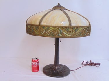 Large slag glass table lamp with panel shade, on rustic tree form base, height is 23.5", shade is