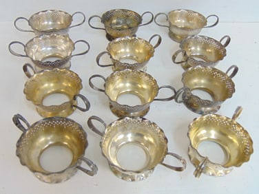 was 160 Set 12 sterling silver cup holders, no inserts, double handled, 38 troy