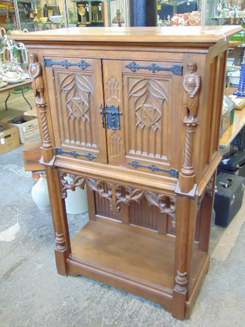 Gothic revival cabinet, double door top, open base with carved figures, cabinet is 38.5" by 18.75" (1 of 5)
