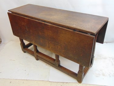 Antique English drop leaf, gateleg table with stretcher base, table is 49.75" by 15.25" (43"