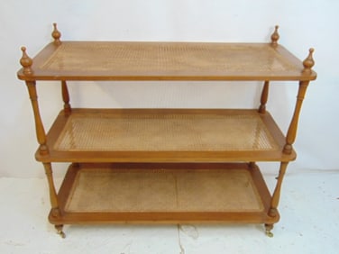 Etagere with caning, wooden turned finial, brass caster one as is, three shelf, 48" x 28 1/4" height