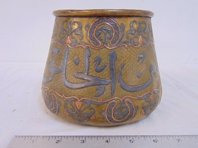 Mixed metal Persian pot, planter, brass with other metals forming text, decoration, 7" wide, height: Mixed metal Persian pot, planter, brass with other metals forming text, decoration, 7" wide, height is 5.5"