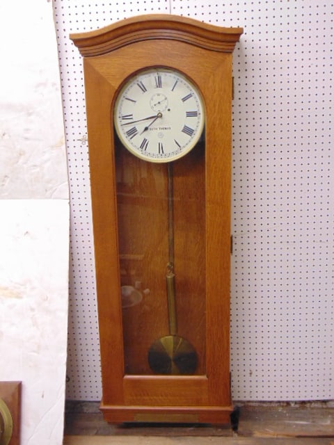 Large oak Seth Thomas regulator 62.75" tall 22 1/2" wide 8 1/4" deep with single brass weight (1 of 3)