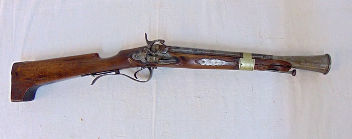 Blunderbuss gun, various marks on the barrel (Bardicado ??) repair to stock, gun is 27.25" long,