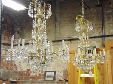 Pair crystal chandeliers, 8 arms each, bottom tiered design, 33" tall, some missing crystals.