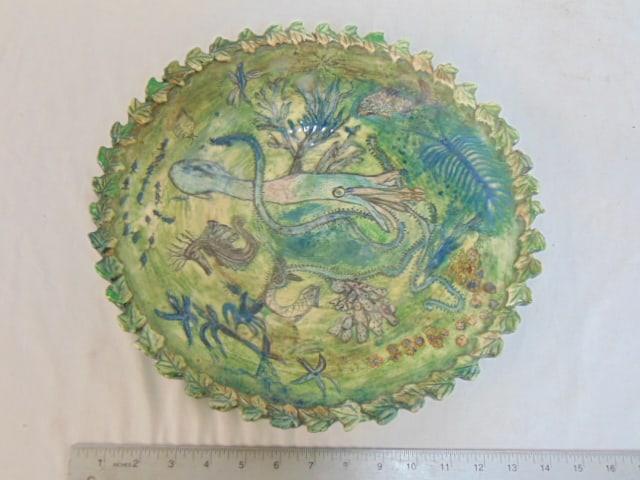 Ceramic studio pottery plate decorated with sea creatures, squid, signed H.R. 1954, diameter is 14", (1 of 7)