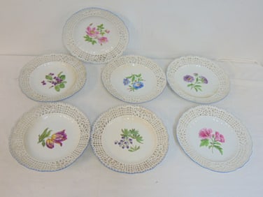 Set of 7 porcelain plates by Meissen, reticulated border with floral center, 9.75", good condition