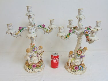 Pair porcelain figural base candelabra, putti playing instruments, 4 arms each, height is 19.5"