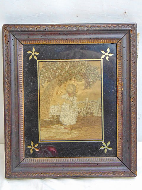 Small embroidery, girl with squirrel under tree, black eglomise border, carved frame, 10.75" by: Small embroidery, girl with squirrel under tree, black eglomise border, carved frame, 10.75" by 9.25"