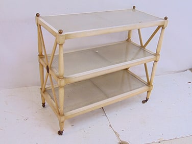 3 tier server in white paint with caned glass covered shelves, brass finials, etagere is 36" by 16",